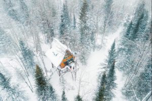 panoramic view of the enchanted chalet, in the wild nature of the high Laurentians