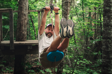 Our treetop adventure course includes several modules, such as a zip line, a maze and a suspension bridge.